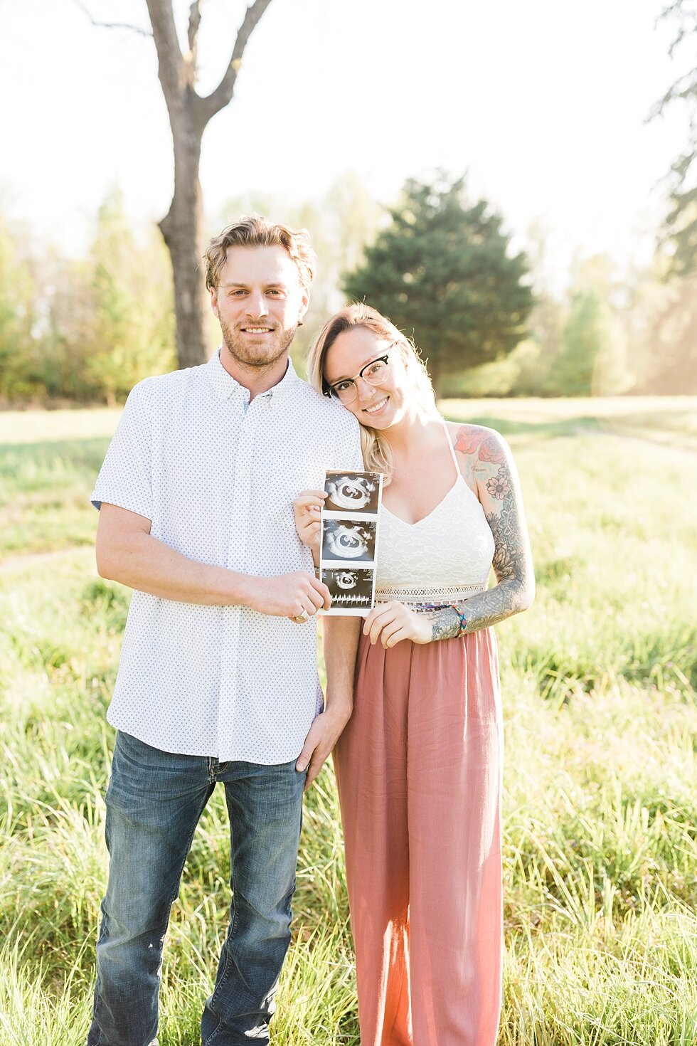  Excitement all around as this southern couple celebrates their new family addition with a spring maternity session. announcement for a southern spring session. couple baby on the way expecting excited maternity photography congratulations announceme