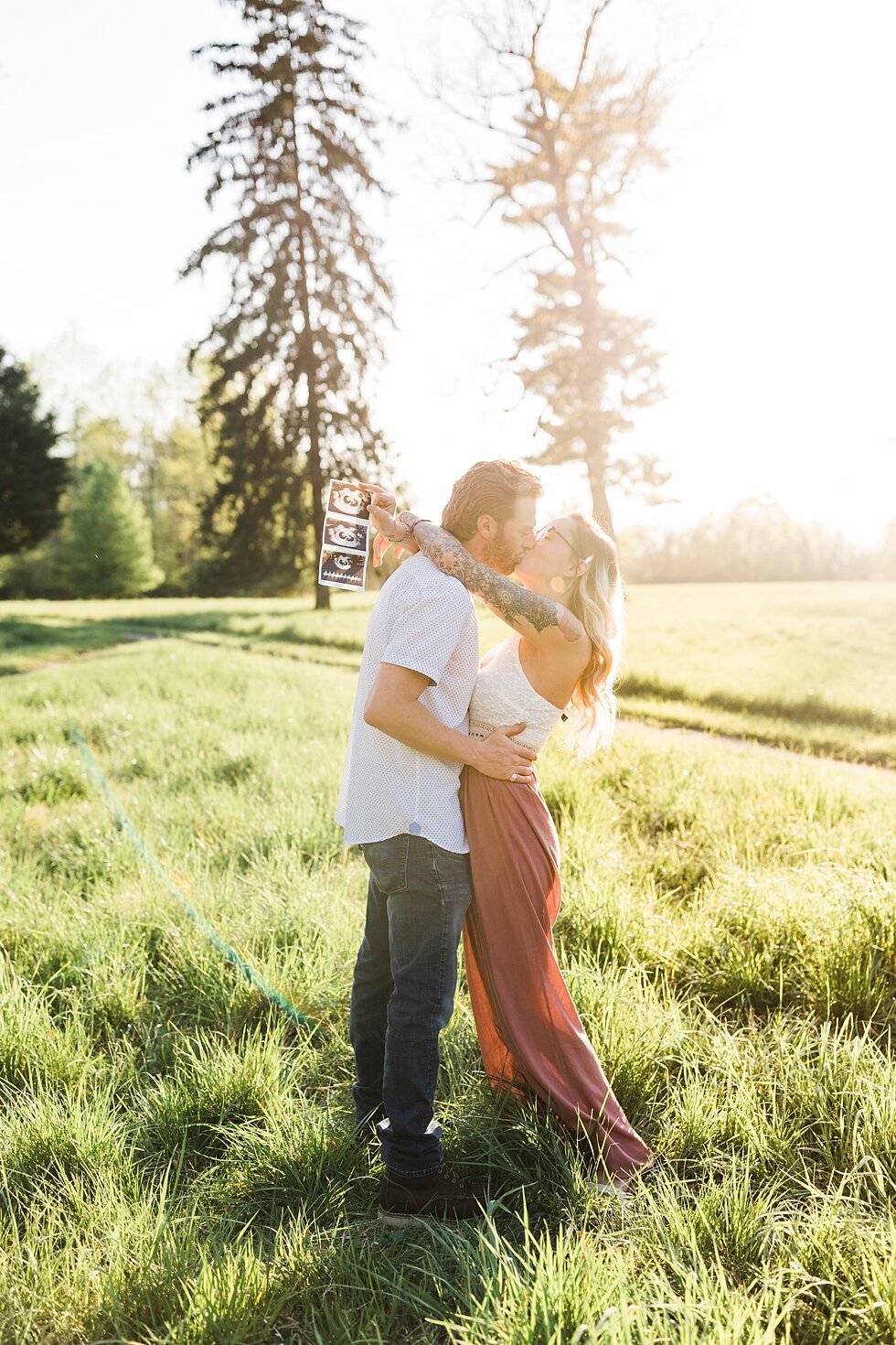  Perfect lighting to end a southern spring maternity session as this couple celebrates their new addition! announcement for a southern spring session. couple baby on the way expecting excited maternity photography congratulations announcement baby co