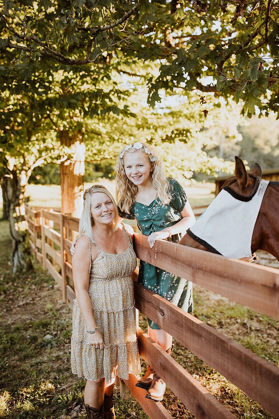  Added element of horses in this mother and daughter photo session as they pose with the animals in the background. Fall Louisville Kentucky photographer mother daughter photography session portraits loving relationship western girls country roots #m