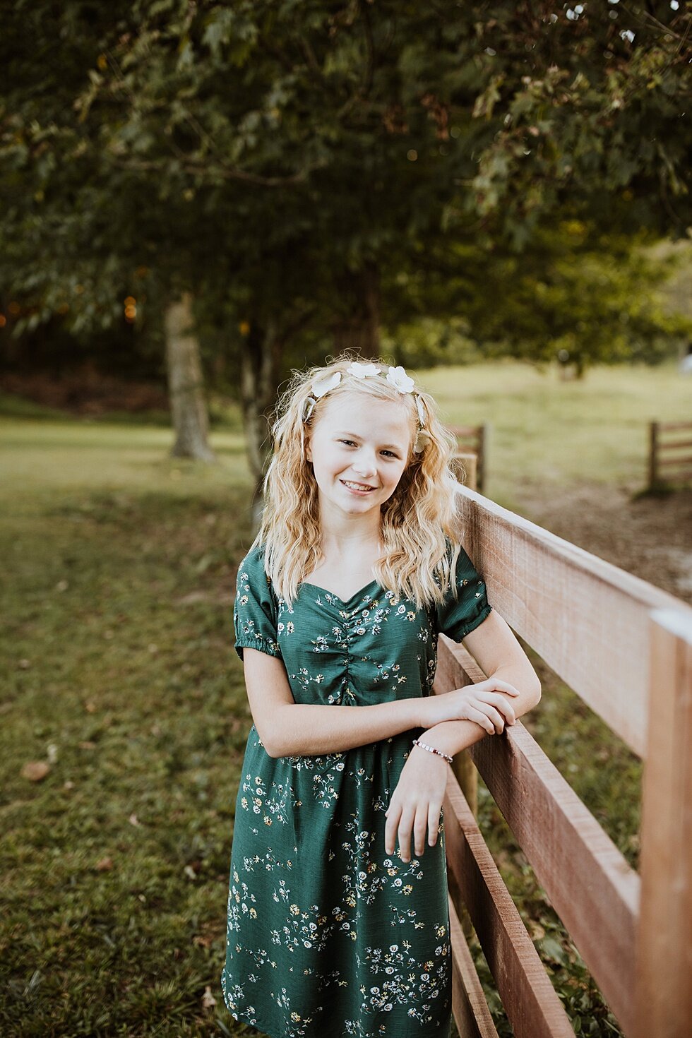  Beautiful girl leaving up against the farm fence during this Midwestern mother and daughter photography session. Fall Louisville Kentucky photographer mother daughter photography session portraits loving relationship western girls country roots #mot