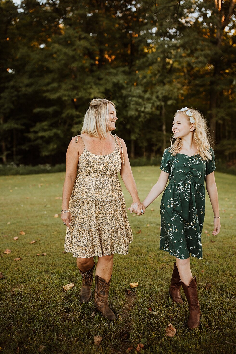  There is nothing like the bond between a mother and her daughter. Such a strong connection made even stronger as you hold hands. Fall Louisville Kentucky photographer mother daughter photography session portraits loving relationship western girls co