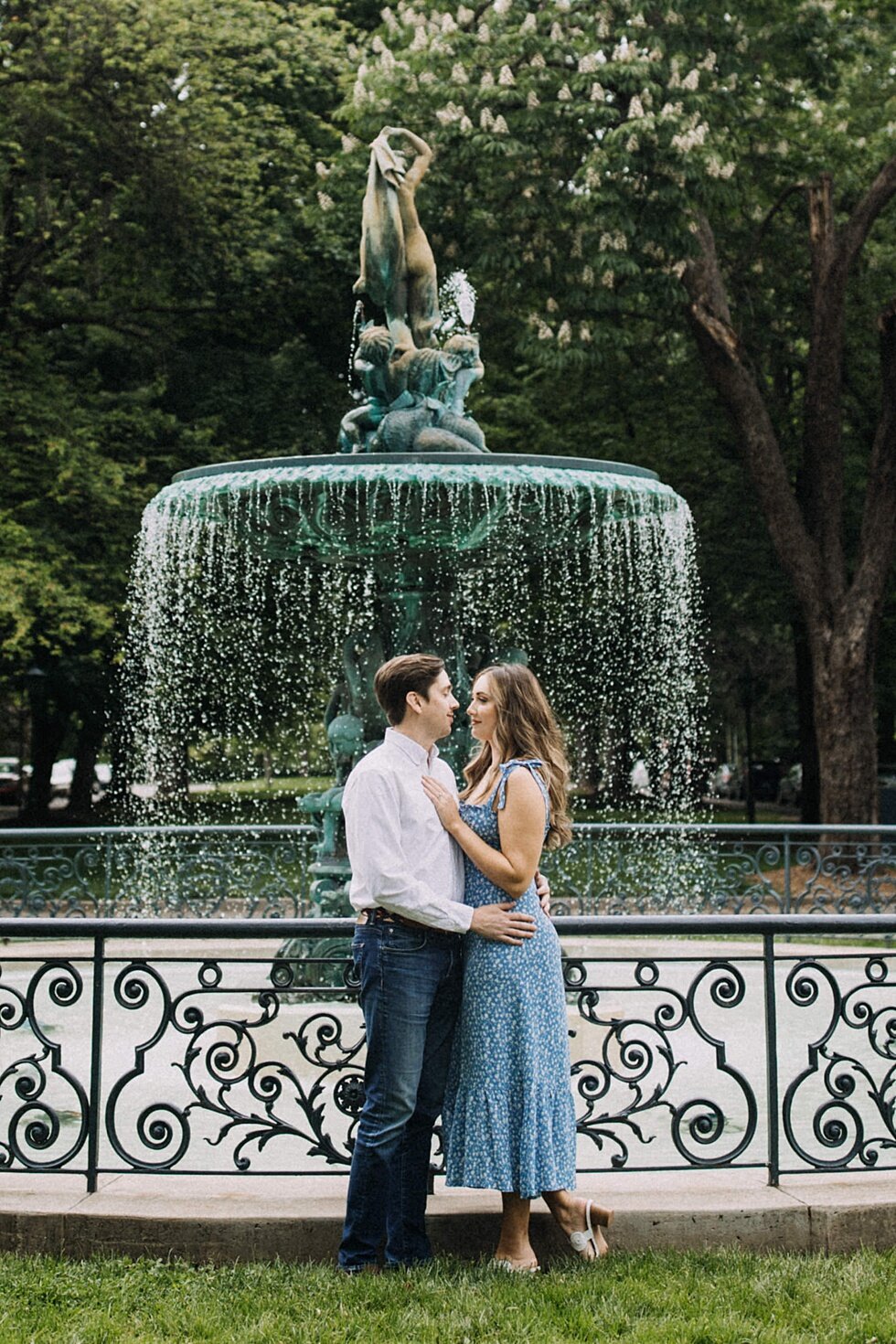  Historic Louisville Kentucky save the date photos in front of the gorgeous water fountains at St James Court and gardens. #engagementphotos #savethedatephotos #savethedates #engagementphotography  #StJamesCourt #gardenengagment   #centralpark #histo