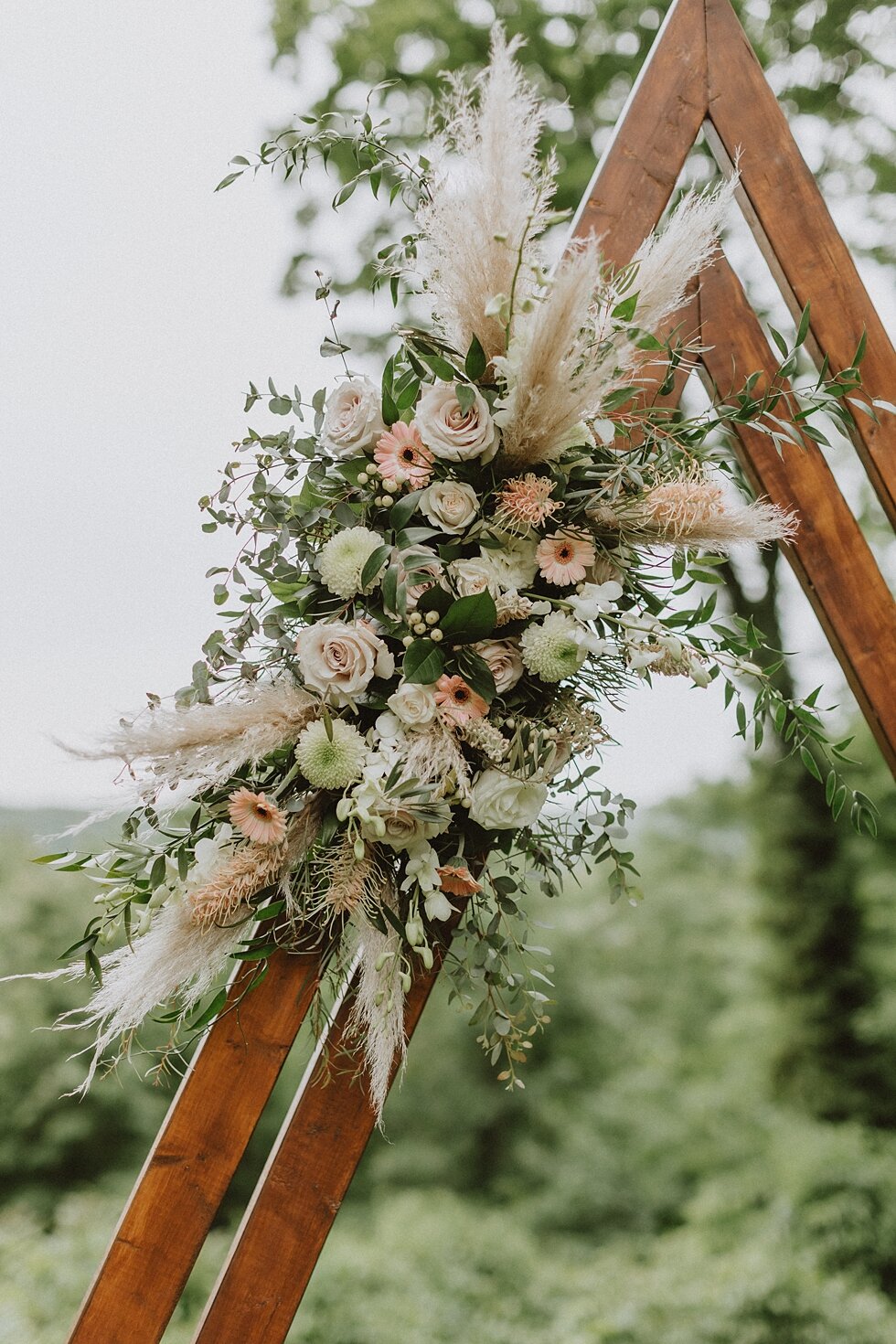  Stunning floral arrangement to accent the handcrafted arch for the elopement ceremony on a spring morning in the south. elopement goshen crest farm louisville kentucky elopement photographer simplistic sweet intimate stunning backyard farm wedding #