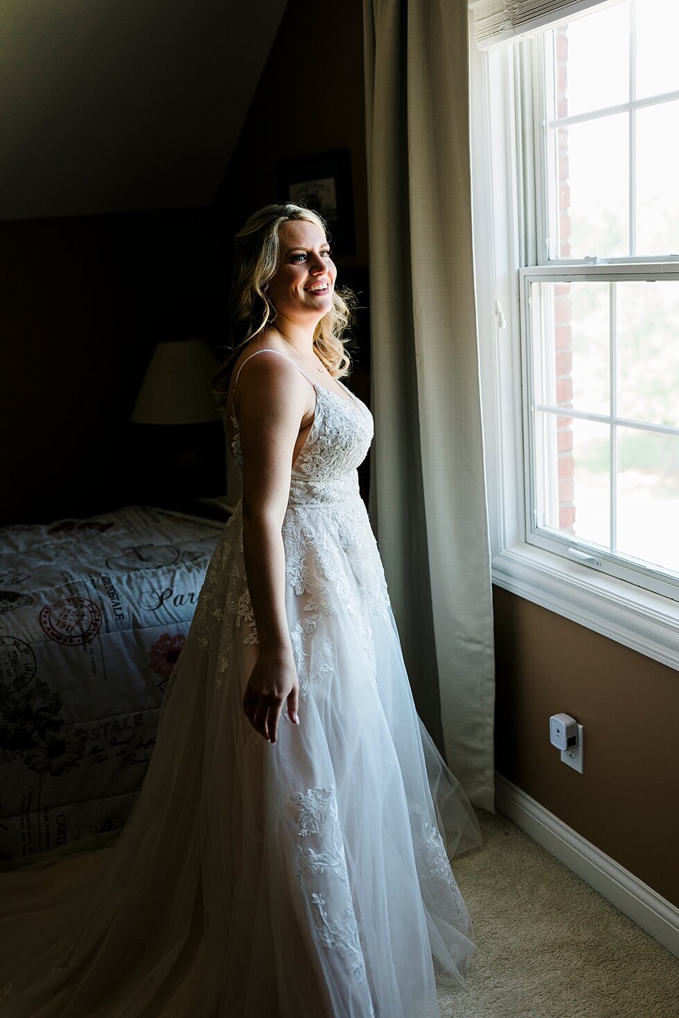  Absolutely stunning bride getting ready to walk down the aisle to become a married woman. Romantic casual lace wedding gown close friends neutral colors background wedding natural greenery crisp white #midwestphotographer #kywedding #louisville #ken