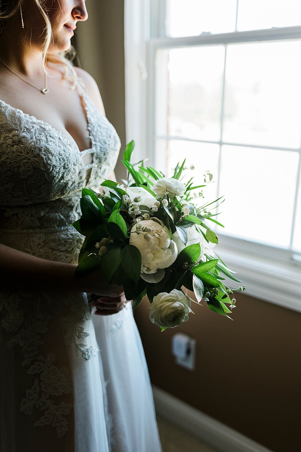  Complete with bridal bouquet, this bride is ready to walk down the aisle. Romantic casual lace wedding gown close friends neutral colors background wedding natural greenery crisp white #midwestphotographer #kywedding #louisville #kentuckywedding #lo