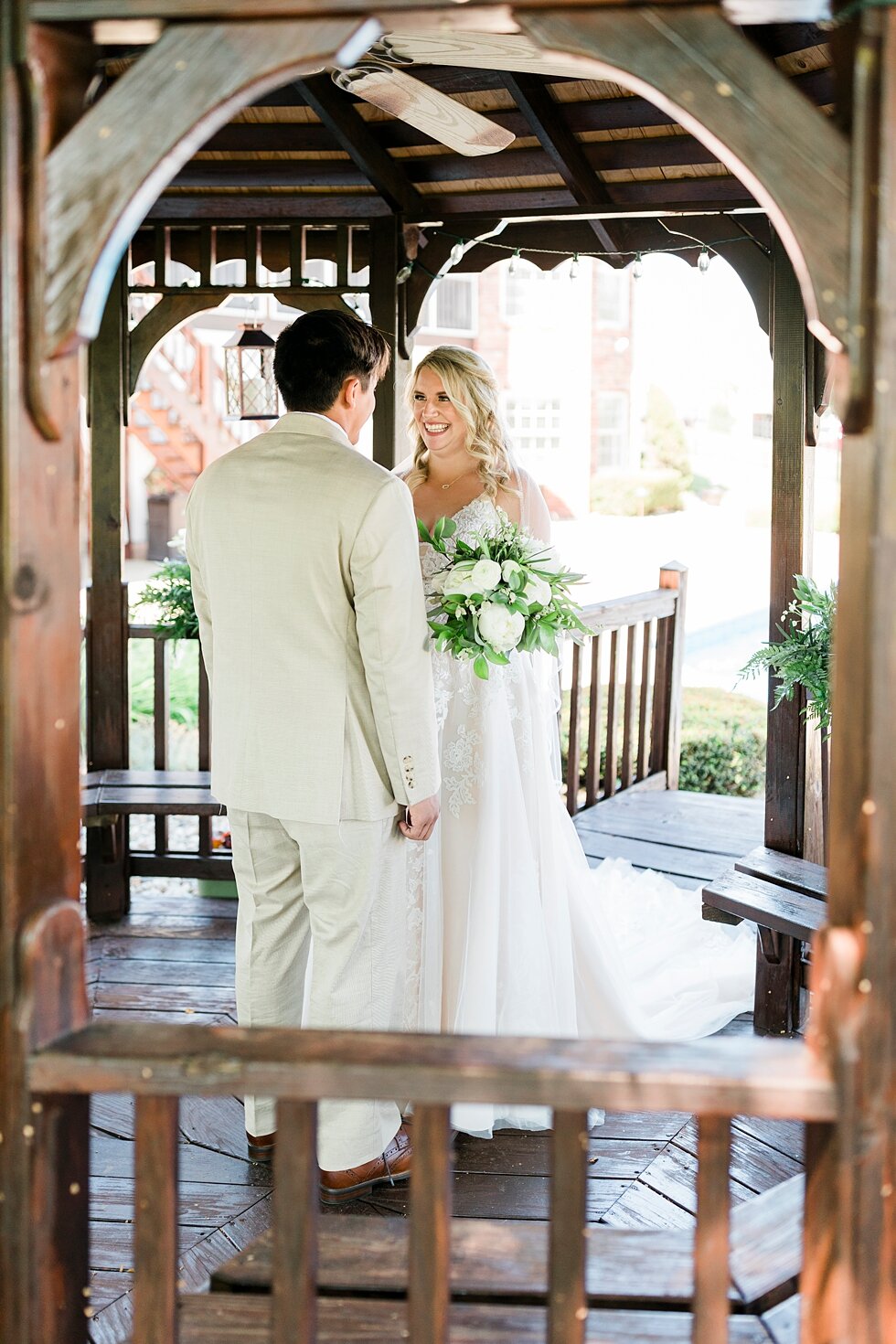  Meeting under the beautiful backyard gazebo was perfect for this couple. Romantic casual lace wedding gown close friends neutral colors background wedding natural greenery crisp white #midwestphotographer #kywedding #louisville #kentuckywedding #lou