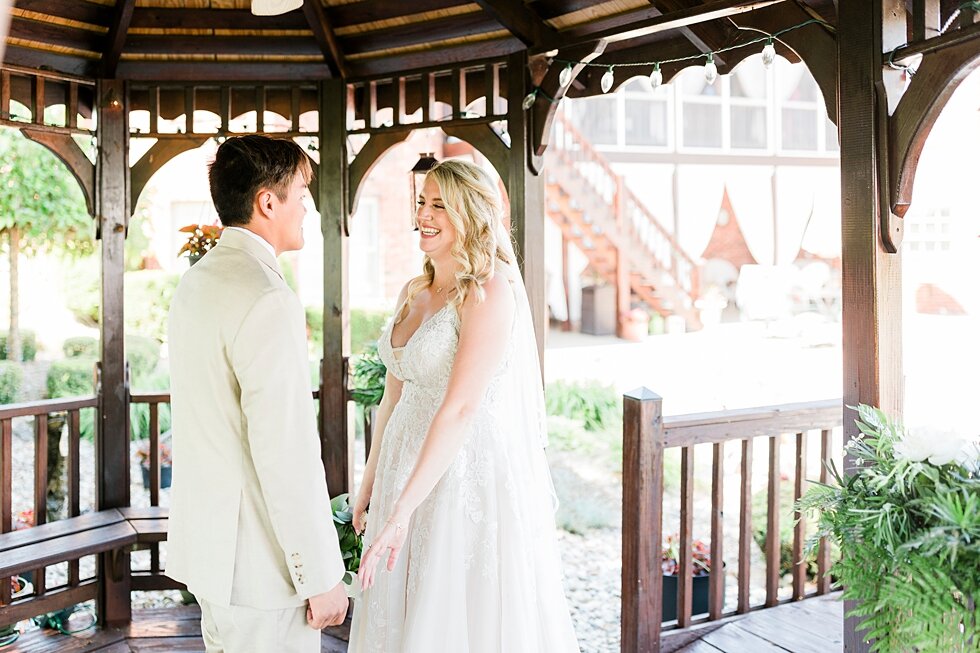  Exchanging vows under this beautiful backyard gazebo was perfect for this sweet couple. Romantic casual lace wedding gown close friends neutral colors background wedding natural greenery crisp white #midwestphotographer #kywedding #louisville #kentu
