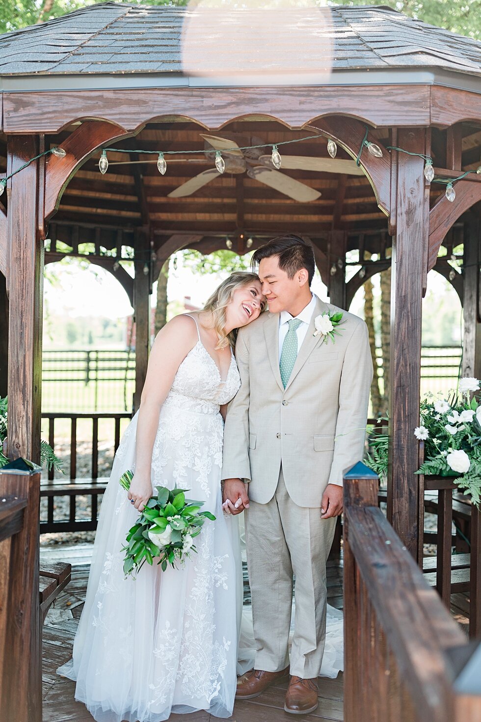  Stunning white flowers with greenery and the neutral color palette for their theme was a great match for this couple. Romantic casual lace wedding gown close friends neutral colors background wedding natural greenery crisp white #midwestphotographer