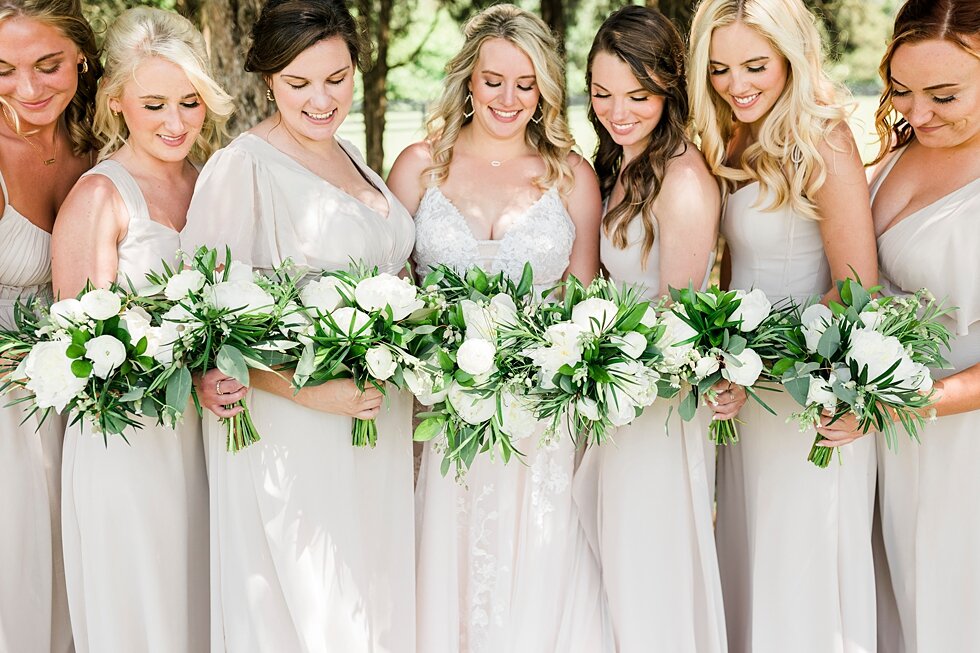  This group of bridesmaids were so caring and supportive for their brand new bride! Romantic casual lace wedding gown close friends neutral colors background wedding natural greenery crisp white #midwestphotographer #kywedding #louisville #kentuckywe