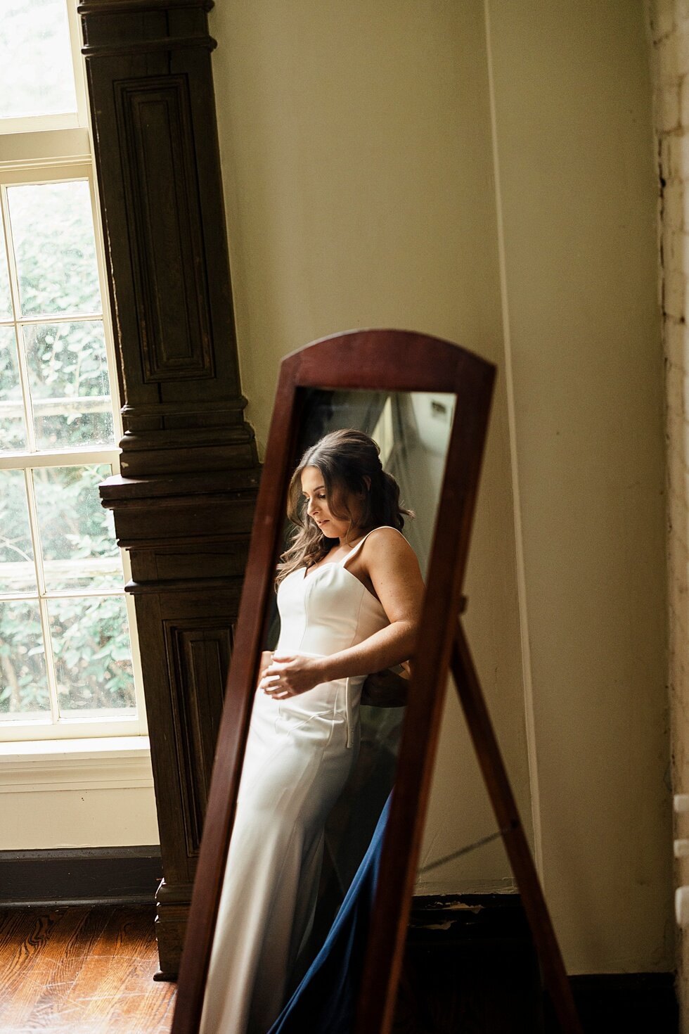  With all the final touches complete, this beautiful bride stood in front of the mirror soaking in all the details of her dress, the day and her wonderful fiancé waiting to become her husband. Kentucky wedding photographer wedding bliss just married 