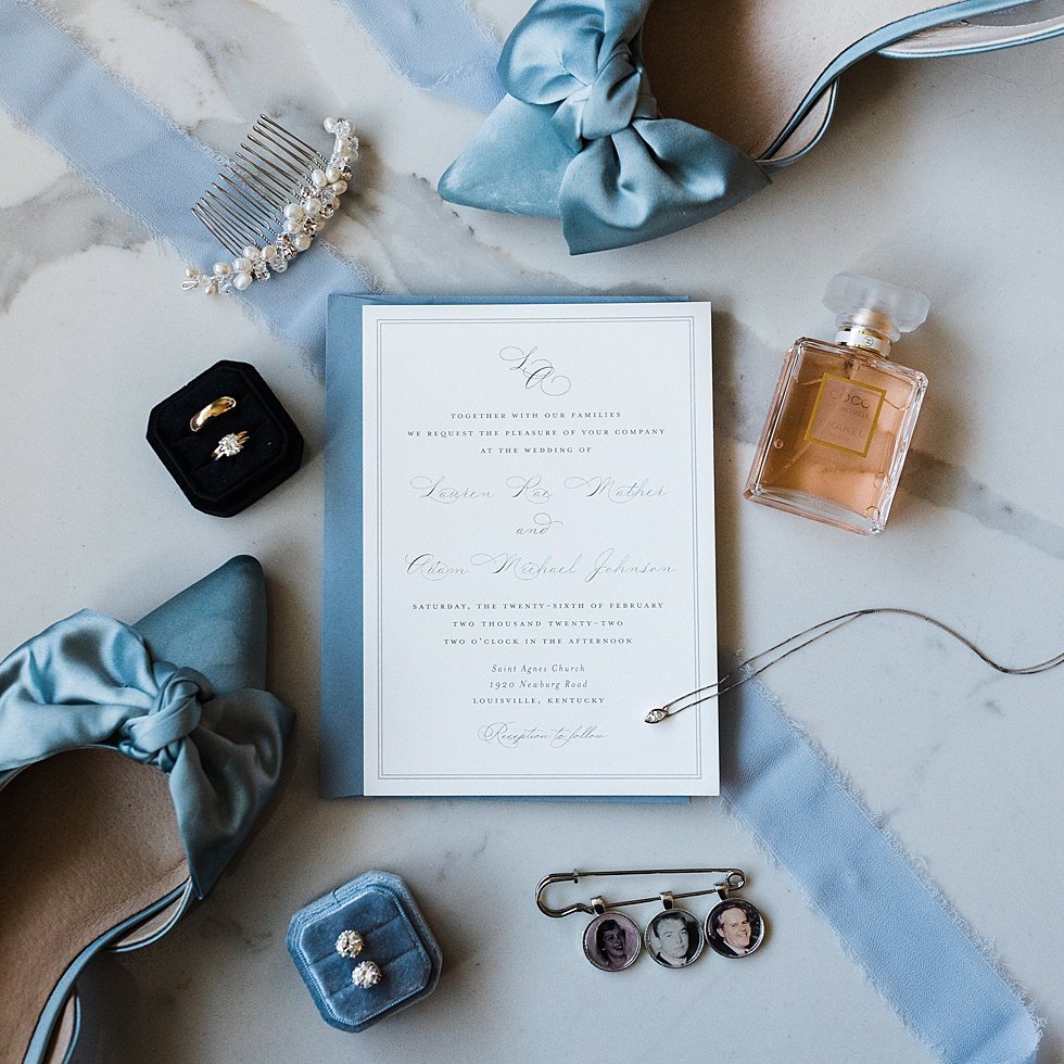  Brides's blue and white wedding day invitation and details. Lauren and Adam's winter wedding at St Agnes Catholic church and the Frazier History Museum. 