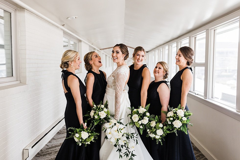  Bride with bridesmaids at Galt House. Lauren and Adam's winter wedding at St Agnes Catholic church and the Frazier History Museum. 