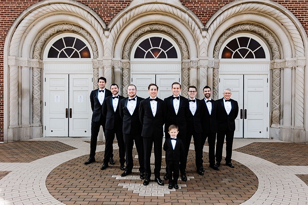  Groom and Groomsmen outside St Agnes Catholic Church. Lauren and Adam's winter wedding at St Agnes Catholic church and the Frazier History Museum. 