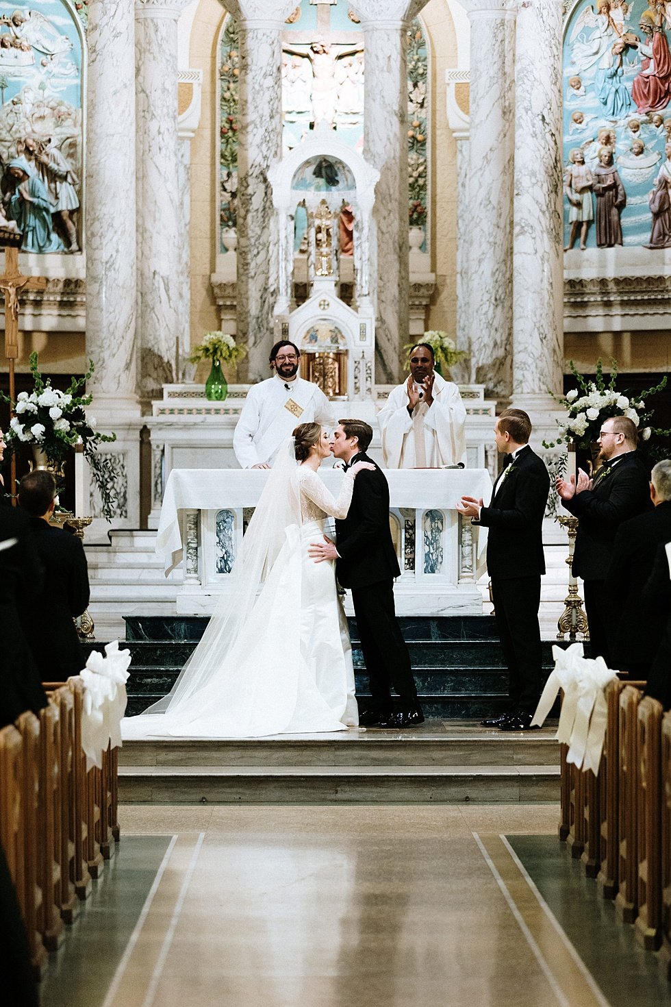  Wedding ceremony at St Agnes catholic church. Lauren and Adam's winter wedding at St Agnes Catholic church and the Frazier History Museum. 