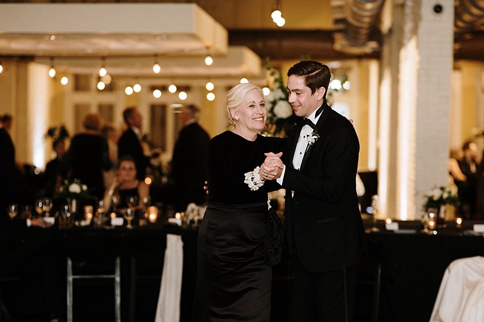  Mother & Son dance at wedding reception. Lauren and Adam's winter wedding at St Agnes Catholic church and the Frazier History Museum. 