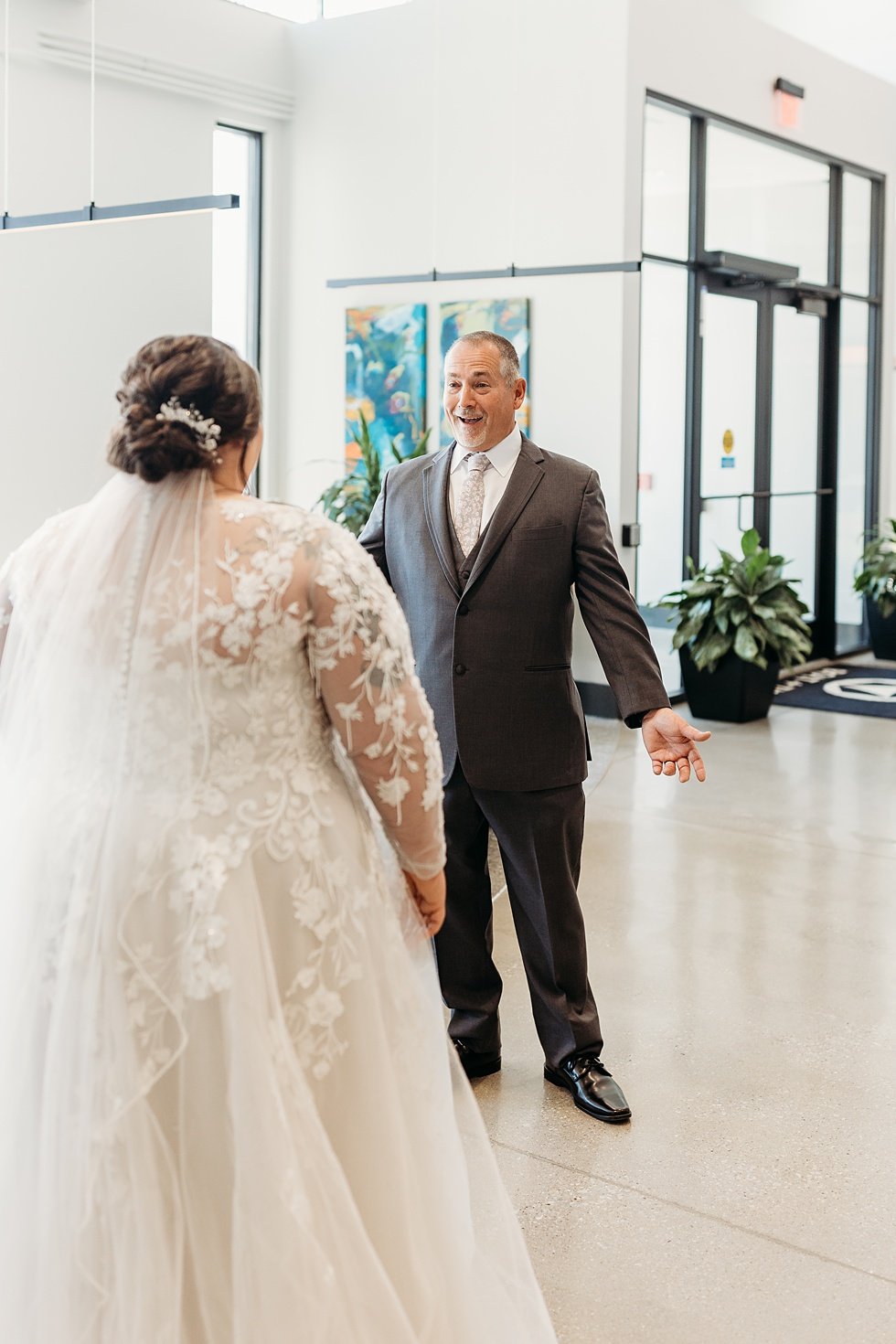  Bride's first look with father. Spring wedding at The Refinery Jeffersonville, Indiana 