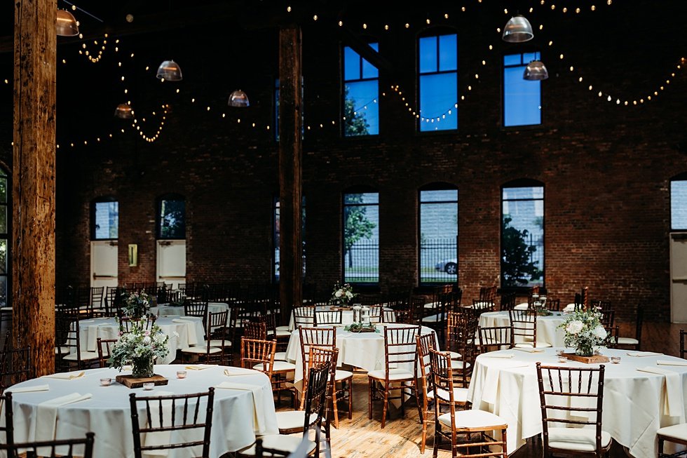  Reception decorations, setip and tables at the Refinery. Spring wedding at The Refinery Jeffersonville, Indiana 