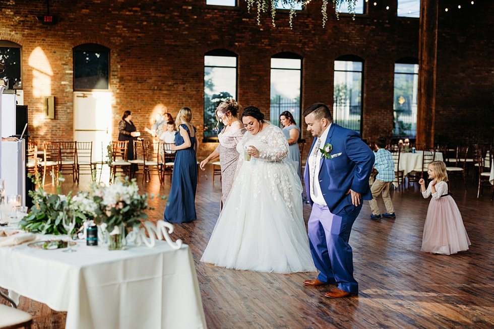  SBride and Groom on dance floor. pring wedding at The Refinery Jeffersonville, Indiana 