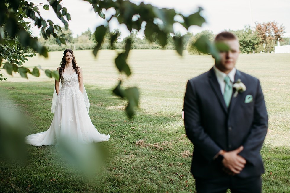  Bride and Groom first look at Huber's Orchard and Winery in Starlight, Indiana. 