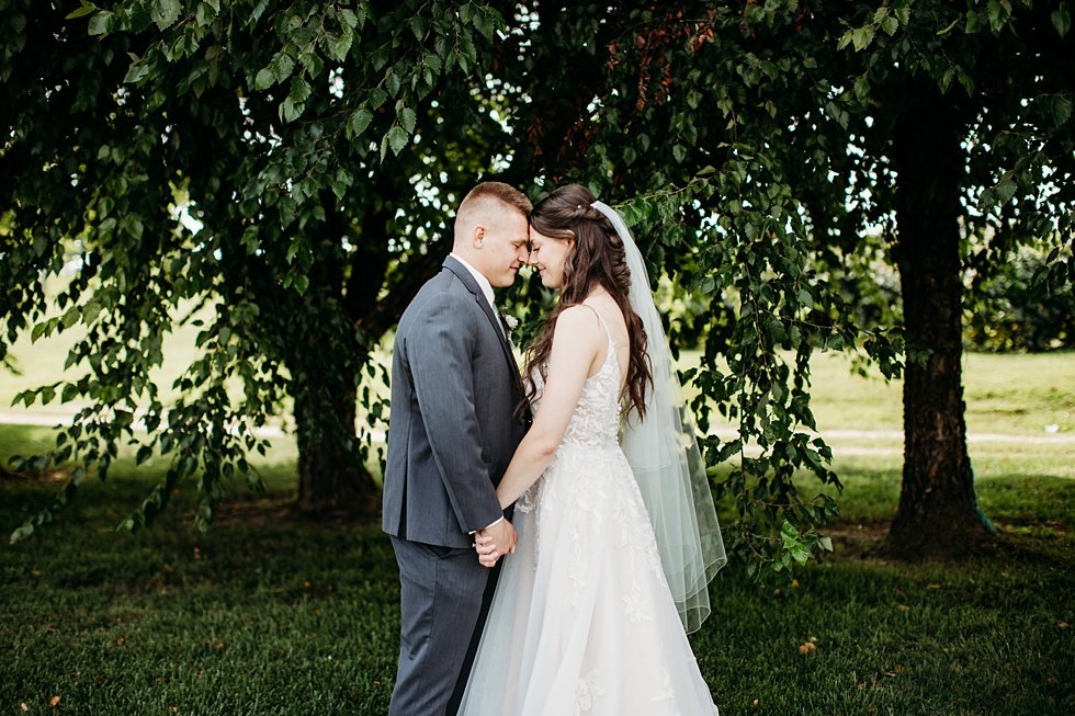  Bride and Groom first look at Huber's Orchard and Winery in Starlight, Indiana. 