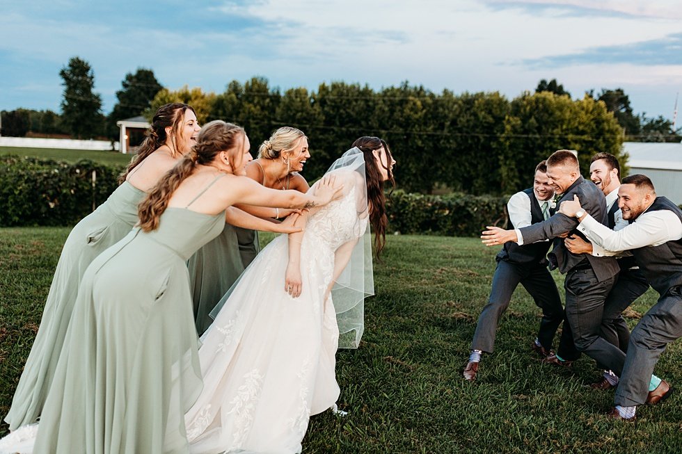  Outdoor summer wedding at Huber's Orchard and Winery in Starlight, Indiana. 