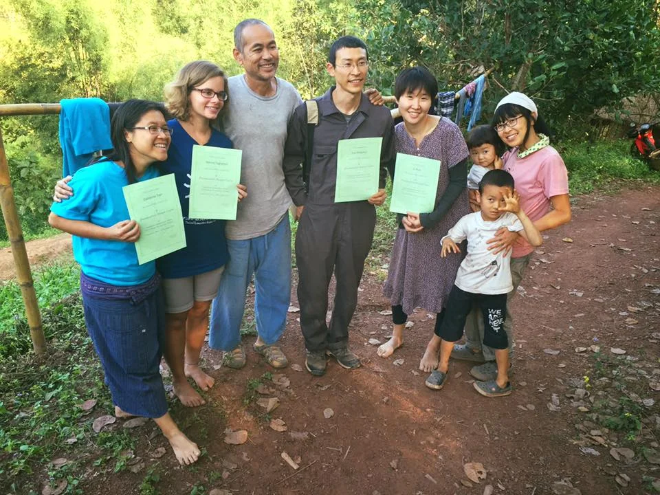 Yuki and his family from Japan - Four years ago, my friend took us to Tacomepai, Sandot s previous farm. People who stay there really enjoying their life even using less energy. By looking at the life style they have in the farm, I think Sandot can save the earth from the world energy problem. My first visit there was only two hours, but it had totally changed my life. I start thinking to live like them after my first visit. Two years ago, I finally got the chance to stay at Sahainan Permaculture Organic Farm. The daily life was very excited. Sandot taught us various DIY techniques. Every time after learning some techniques, I became more free from money. I do it by myself, i get more freedom from the money system. I can now live calmly with the nature. And, the practical permaculture course here is also very good. We learn not only theory, but also a lot of hands on practices. And on the last day of the course, we made presentation of our future permacultural life. I still keep the presentation paper until now, and sometimes looking at it. After I left Sahainan and came back to Japan, I started my new job. The job is running a "Permaculture Laboratory". I am now able to live a more permaculture life and teach about permaculture.