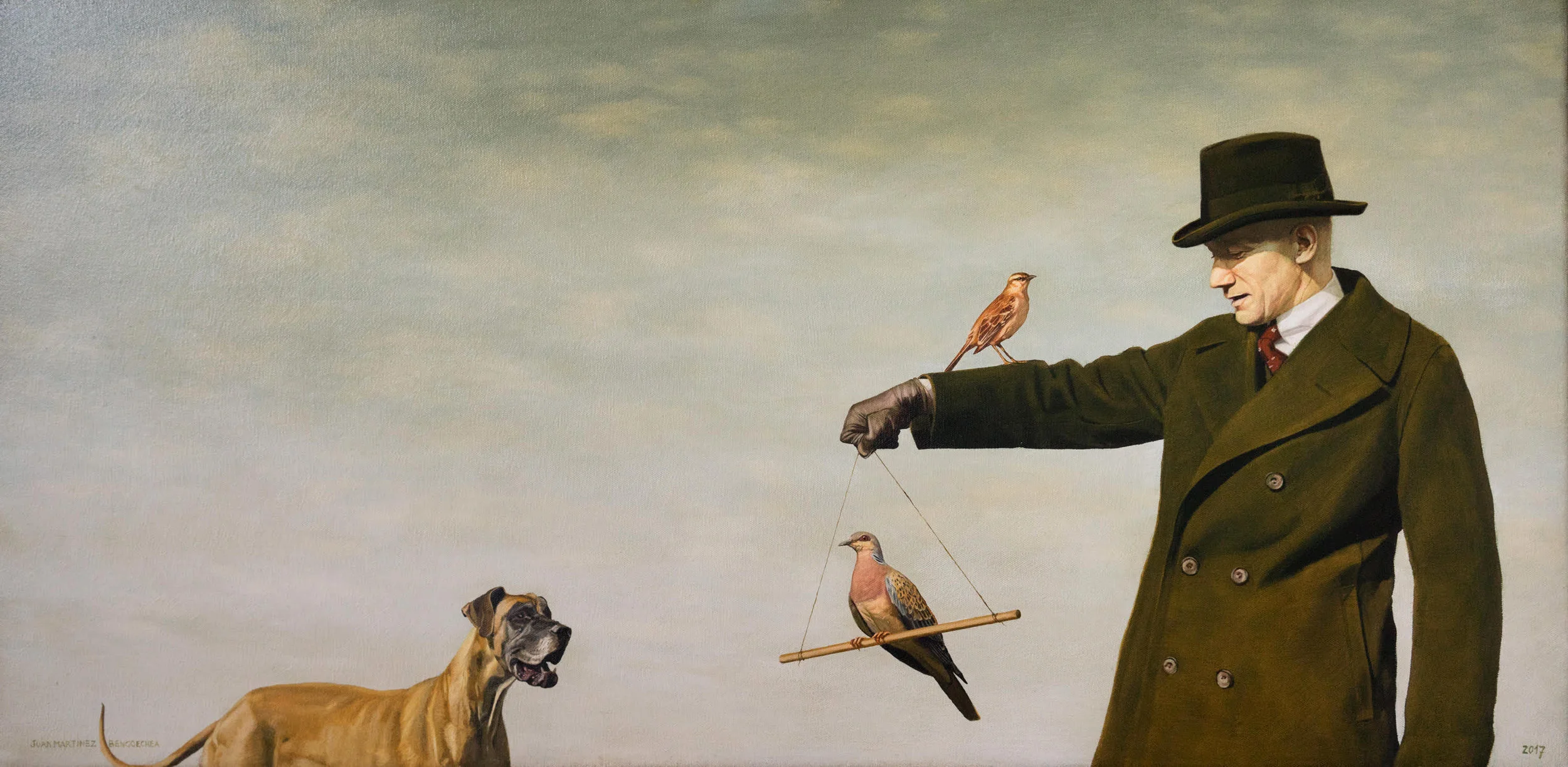 Hombre con pájaros