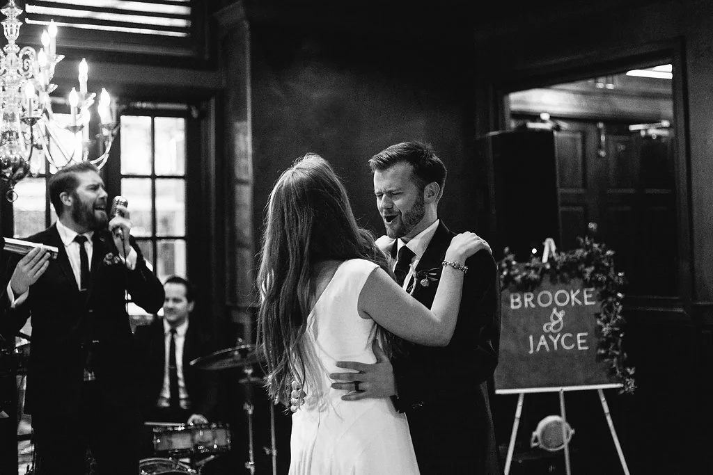 The Bride and Groom dance before their guests. Photo courtesy of Shannon Elizabeth (shannonelizabethphoto.com)