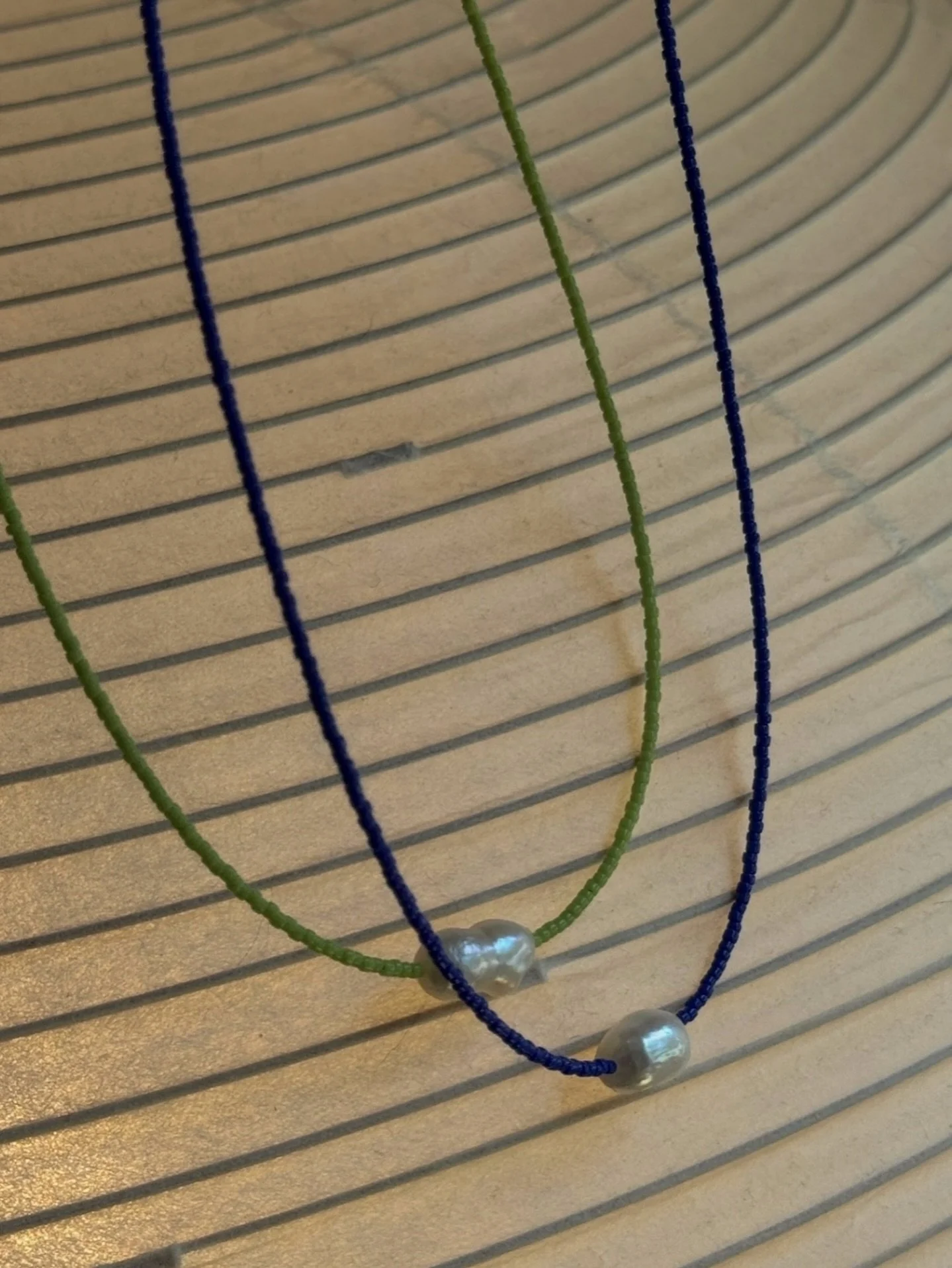 S+P essential pearl necklace in matcha and lapis 〰️
