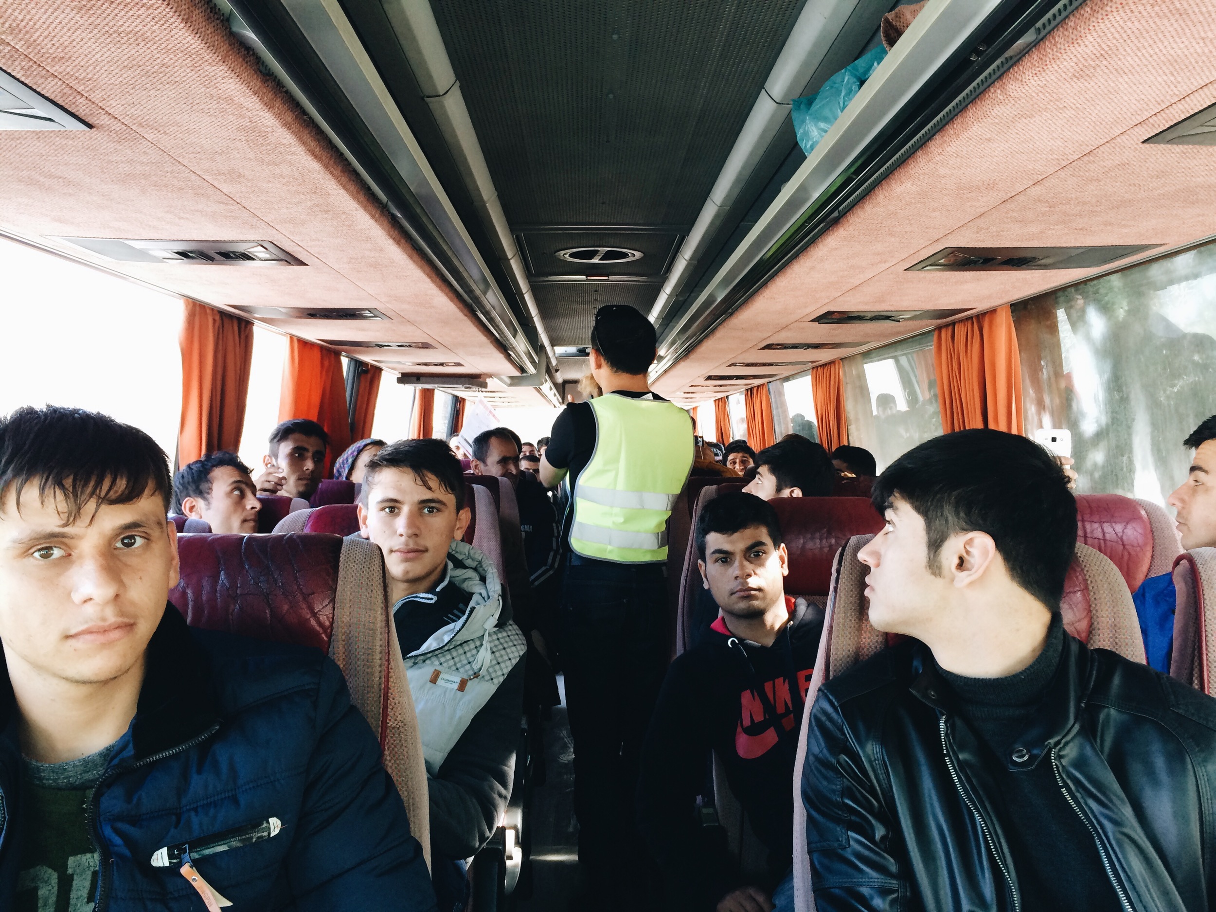 Receiving instructions on the bus to Moria Camp