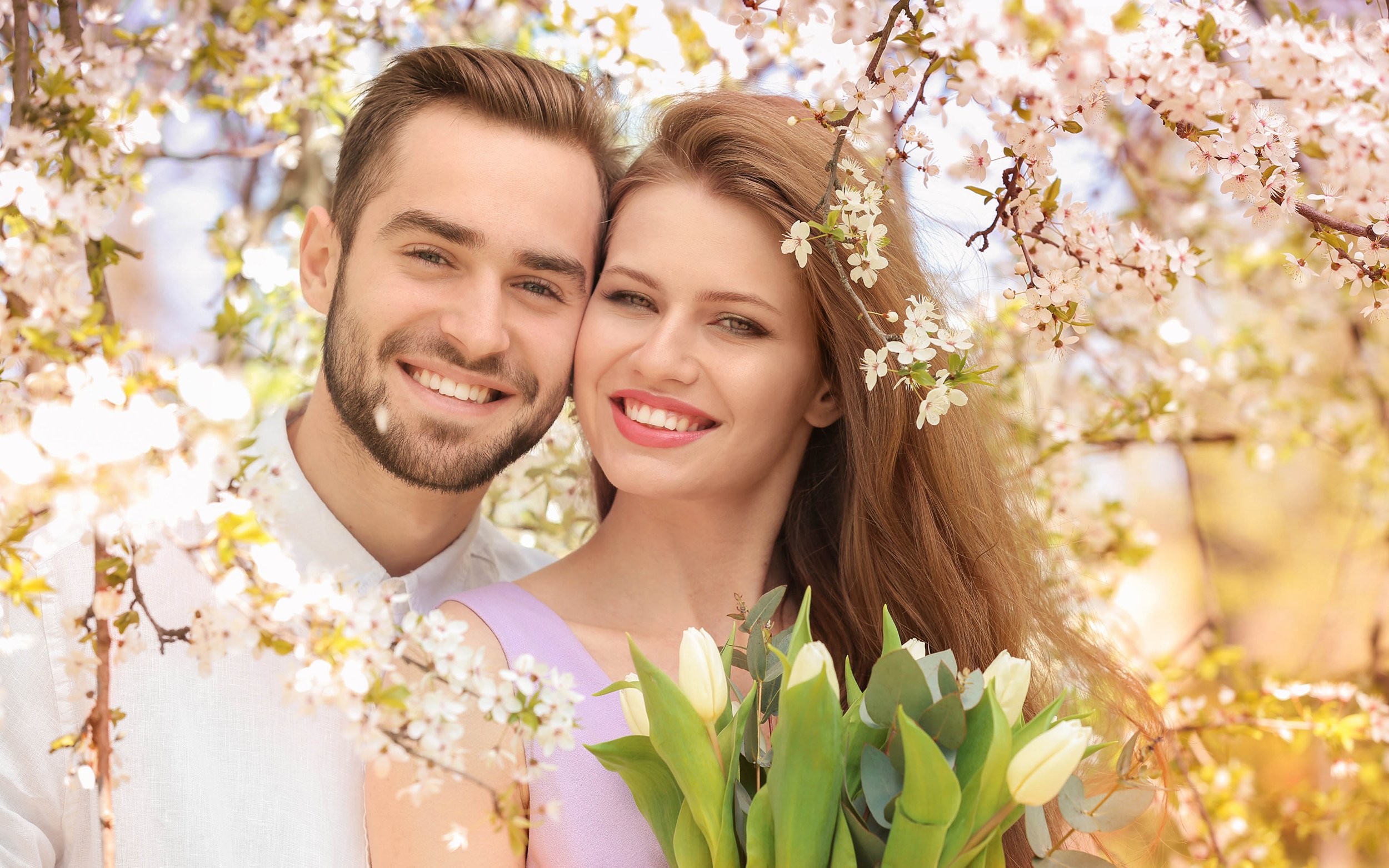 Love-beautiful-couple-girl-man-lovers-smile-spring-tulips-flowers.jpg