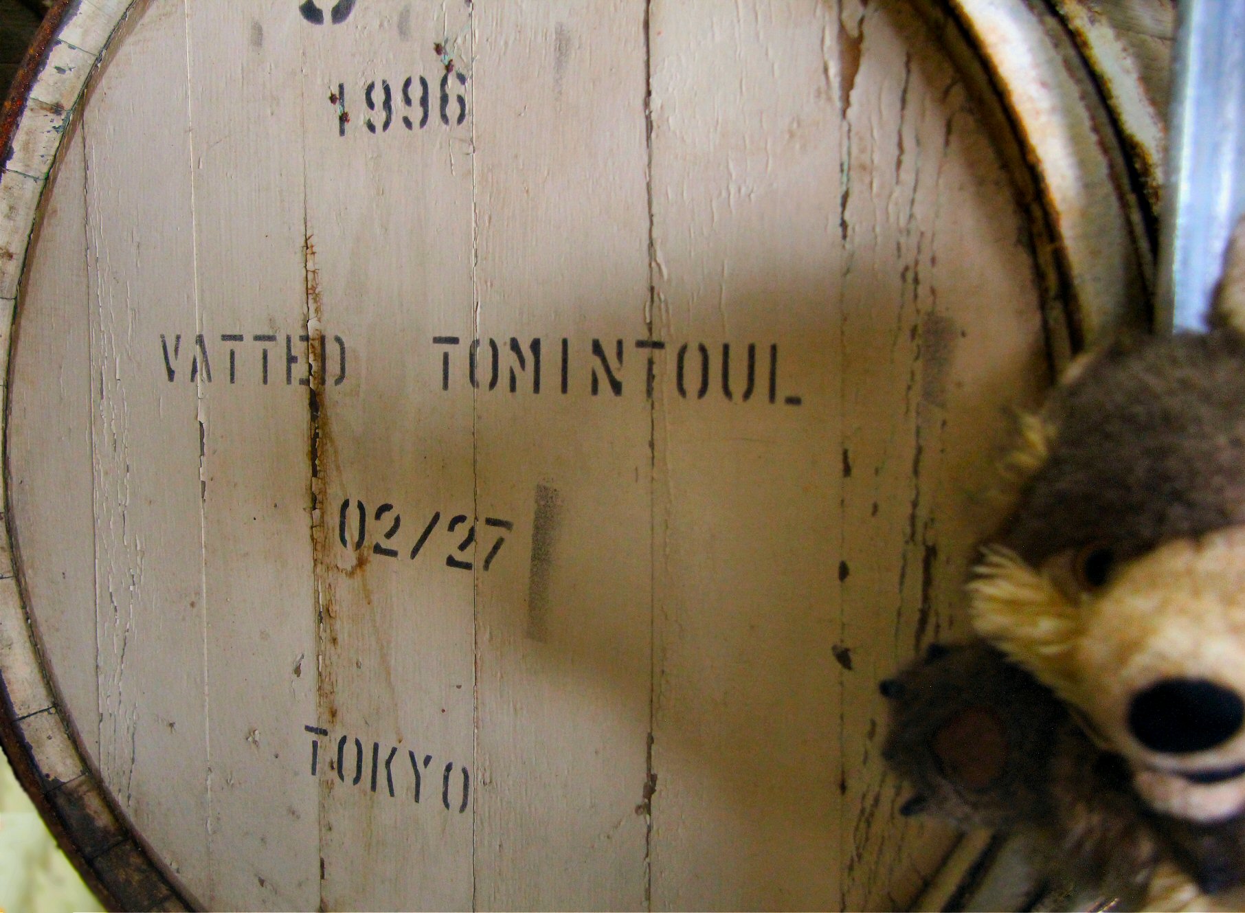 Our intrepid rodent has sniffed out the source of this goodness on the back of the casks....
