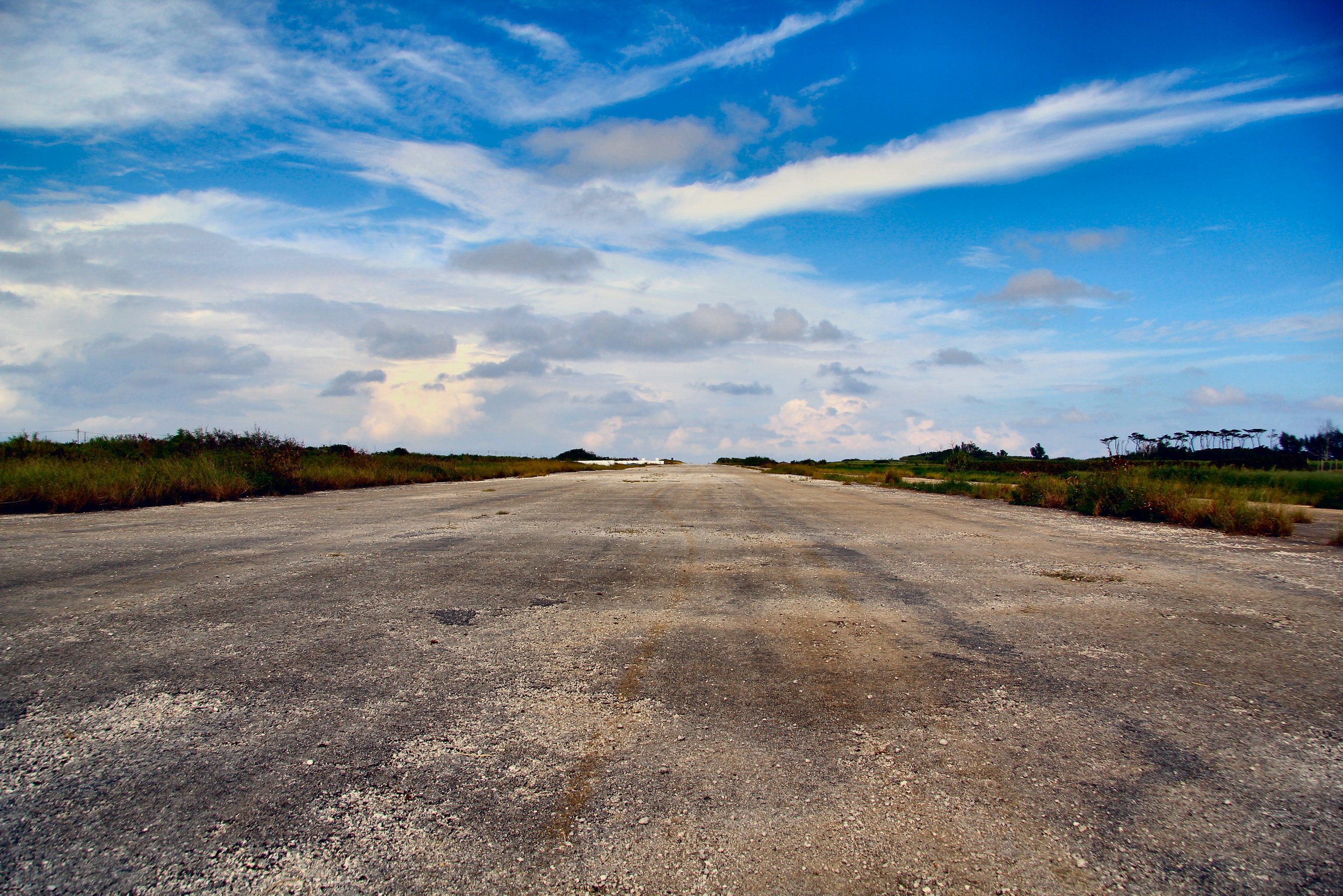 The abandoned US runway that now links the north and south of the island. Imagine a P38, a Corsair, a B25 rolling down here, because they did. I didn't use it to rev out my Nissan Cube. Honest. Pitty I left the Hayabusa at home. 