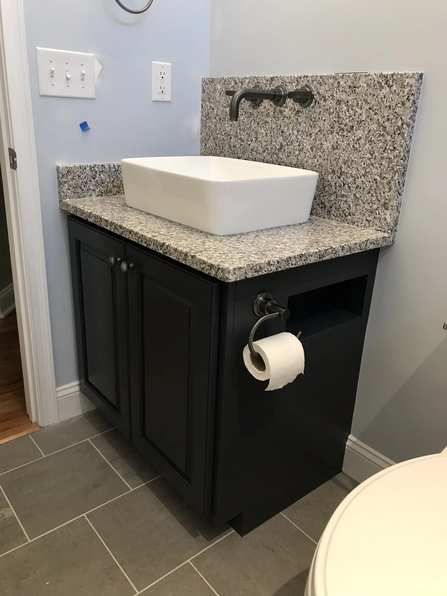 Extra built in toilet paper shelf 