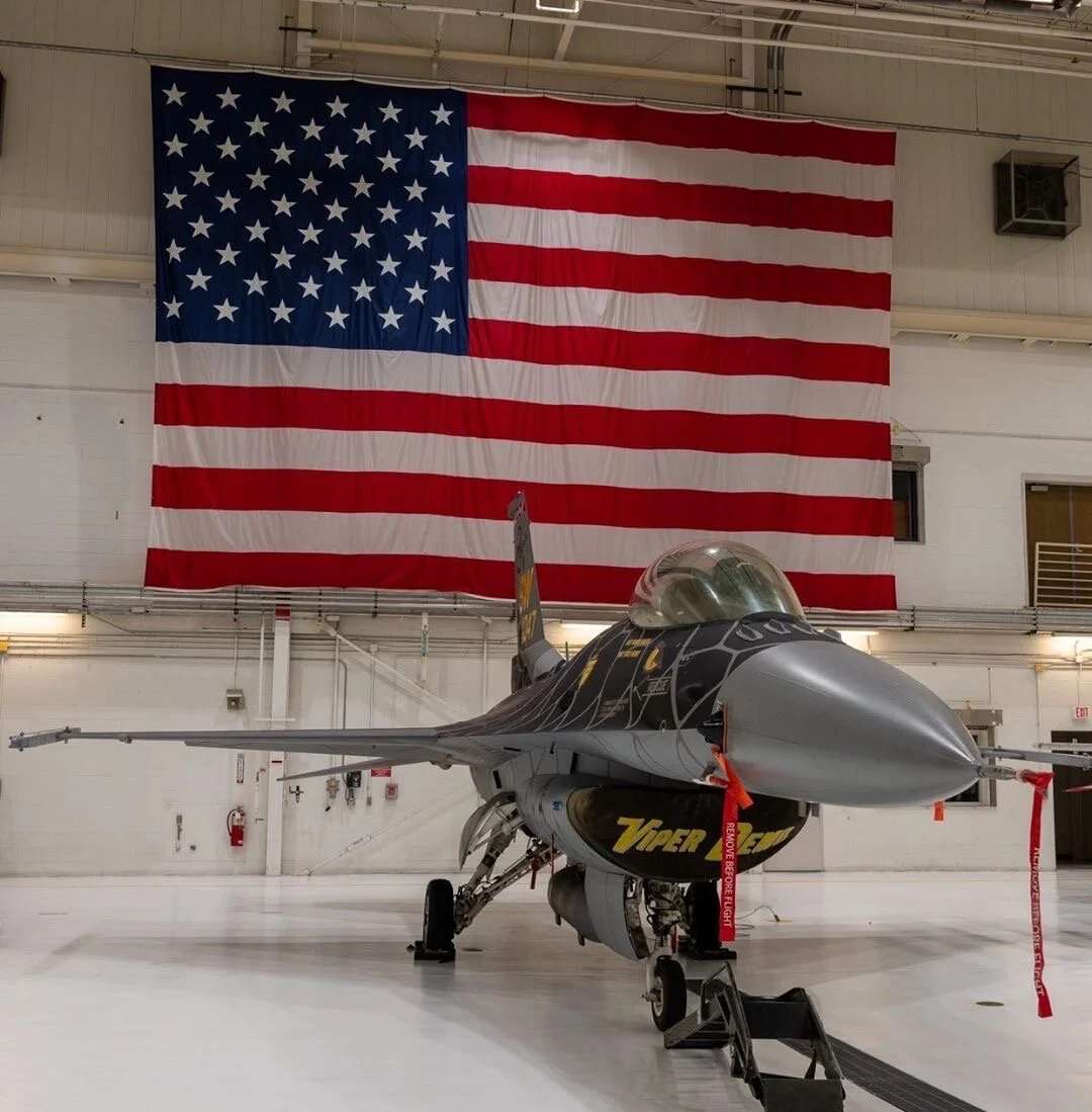 The F-16 Viper Demo Team’s “Venom” jet sits in a hangar at Selfridge Air National Guard Base ahead of Airshow London. Photo courtesy of Staff Sergeant Robert “Bobby” Harper.
