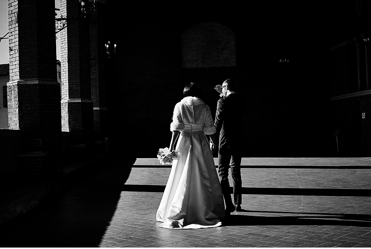  Winter wedding in Tuscany, on a beautiful sunny day. The ceremony was celebrated in the cityhall Concistoro room of Siena, overlooking Campo, the magnificent square where every year the palio is held. The reception was held at Le Volte di Vicobello,