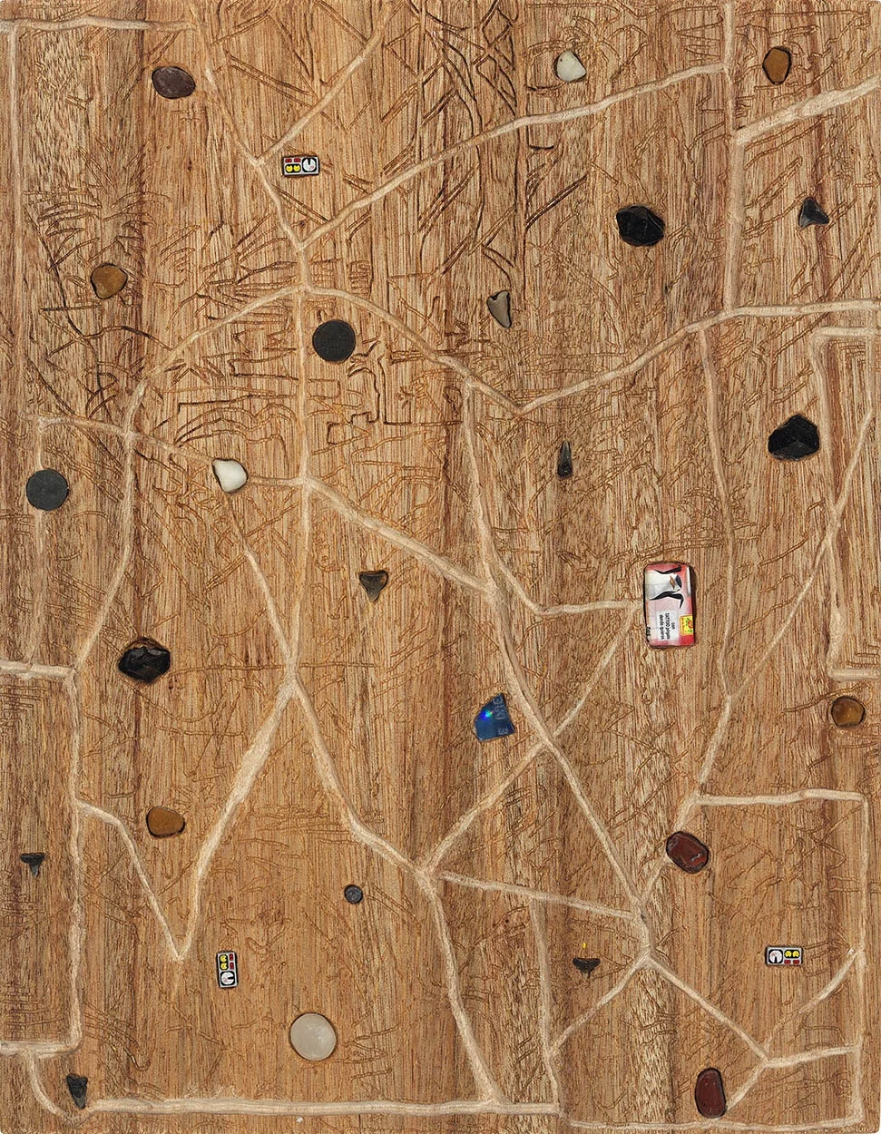 Parasite's Birthright , 2013, rocks, fossilized sharks' teeth, lead, candy, plastic, and wood, 20" x 16"