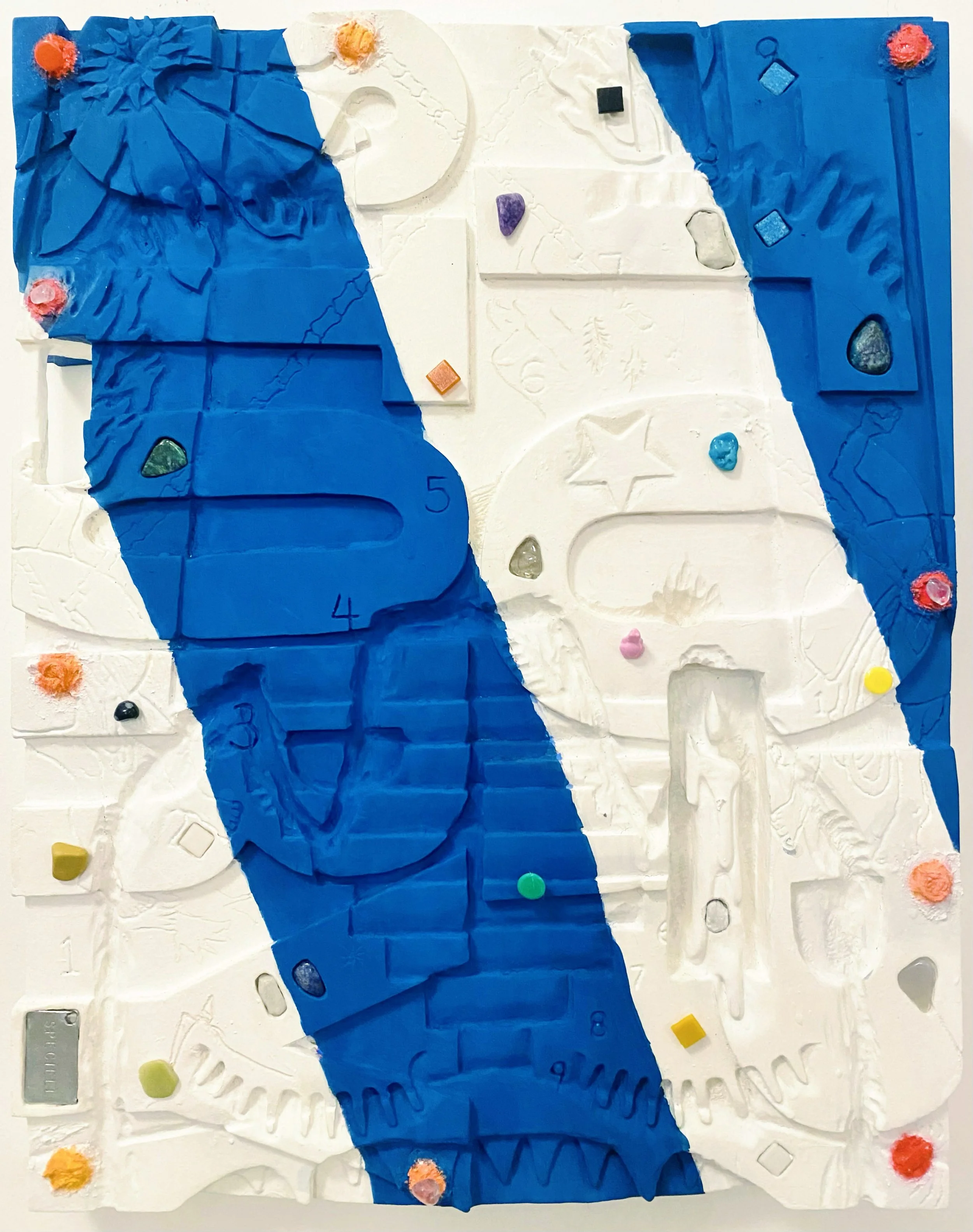 Tumbert , 2025, casein, rocks, fossils, Legos, crystals, turquoise, mosaic glass, thumb tack, and found objects on carved walnut, 18” x 14” x 2”