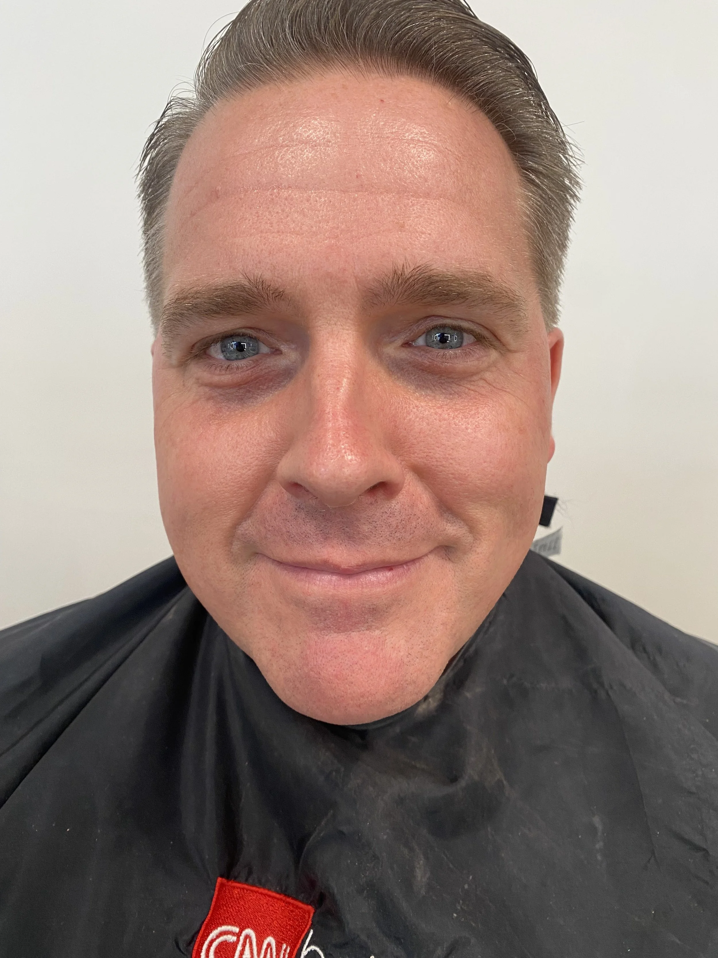 On air talent for CNN, I wanted to even his skin tone and reduce the darkness under his eyes. I used an orange color corrector before concealer and MAC studio fix powder