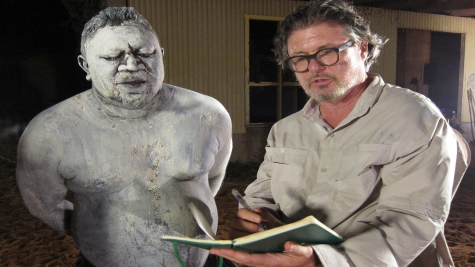    Rupert Manmurulu, &nbsp;known as   The  &nbsp;  Giant, writes a poem with host Bob Holman  &nbsp;during the Coroboree ceremony on Goulburn Island, NT, Australia.  