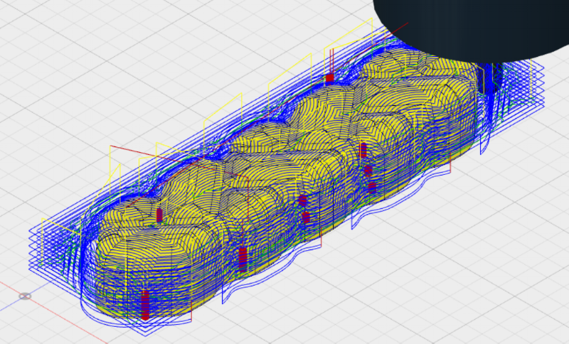  I have done some very basic cam profile cutting in the past but this is my first foray into 3D carving. The part is produced in three passed: first the material around the finished piece is removed in a pocket clearing operation, then a spiral scall