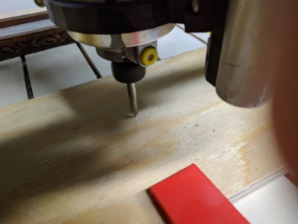  Test cutting on a piece of plywood, only one shot at the final box. 