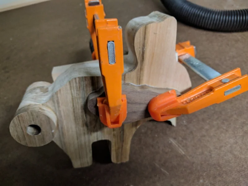 The ears and spots were inlaid with walnut.