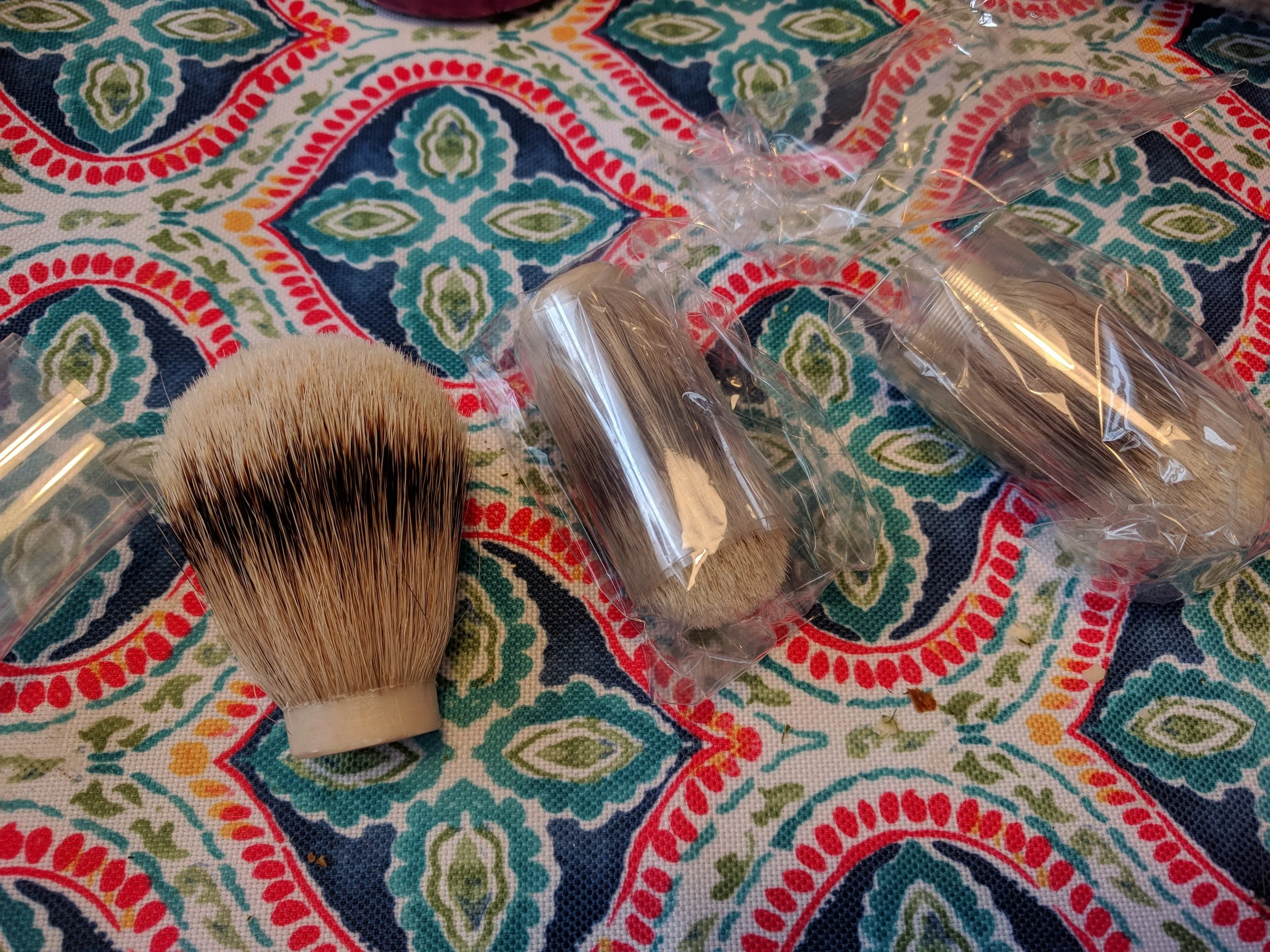 Three knots of silver tip badger hair, it is the top of the line in luxury of feel and water retention. One knot is for myself, the other two I plan to sell to fund the hobby. All badger comes from China, and these knots took over a month to arrive.