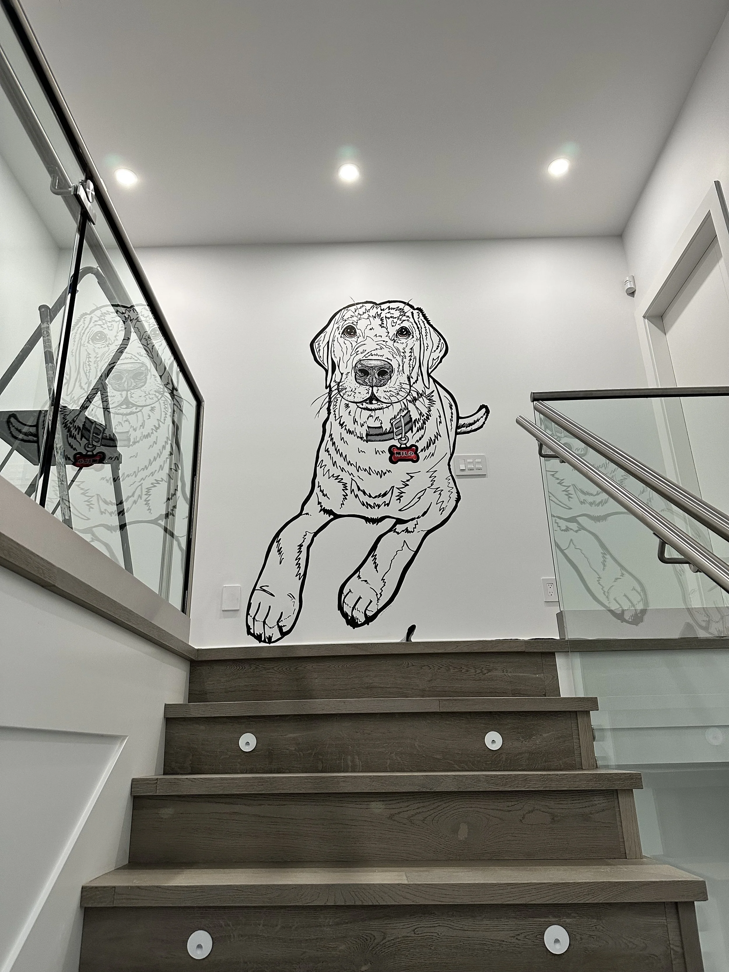 This is a clients dog placed at the top of their new home. Done in a graphic style with only line art and just a touch of colour.