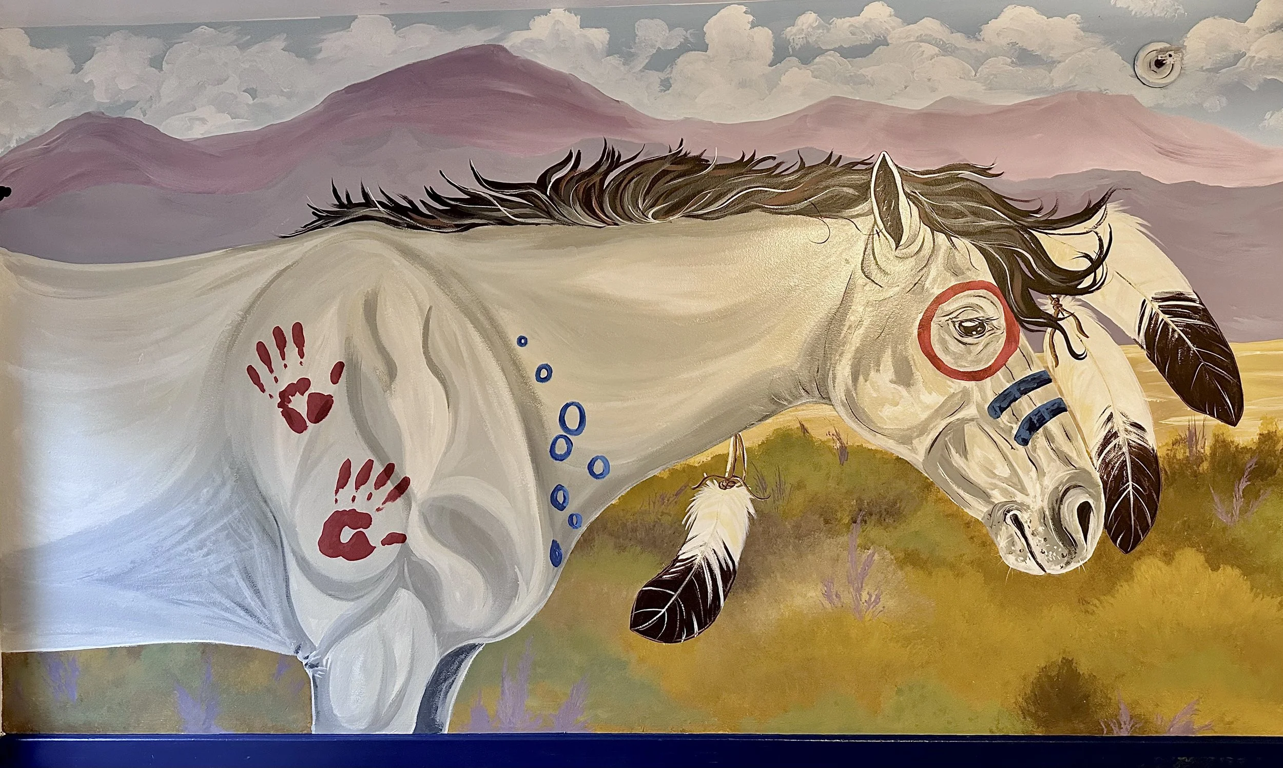 This project was done in a group home setting. the gentleman who lived there spends lots of his time in his bedroom and wanted to connect back to his native roots. I came up with this design for him. He's people originate from Alberta so i painted so