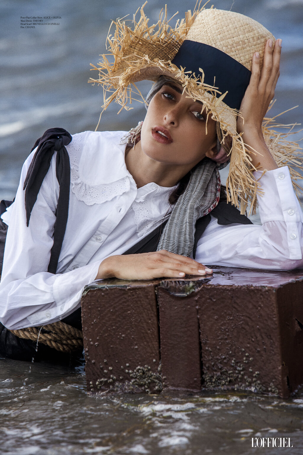 giant straw hat on the beach unconventional looks.jpg