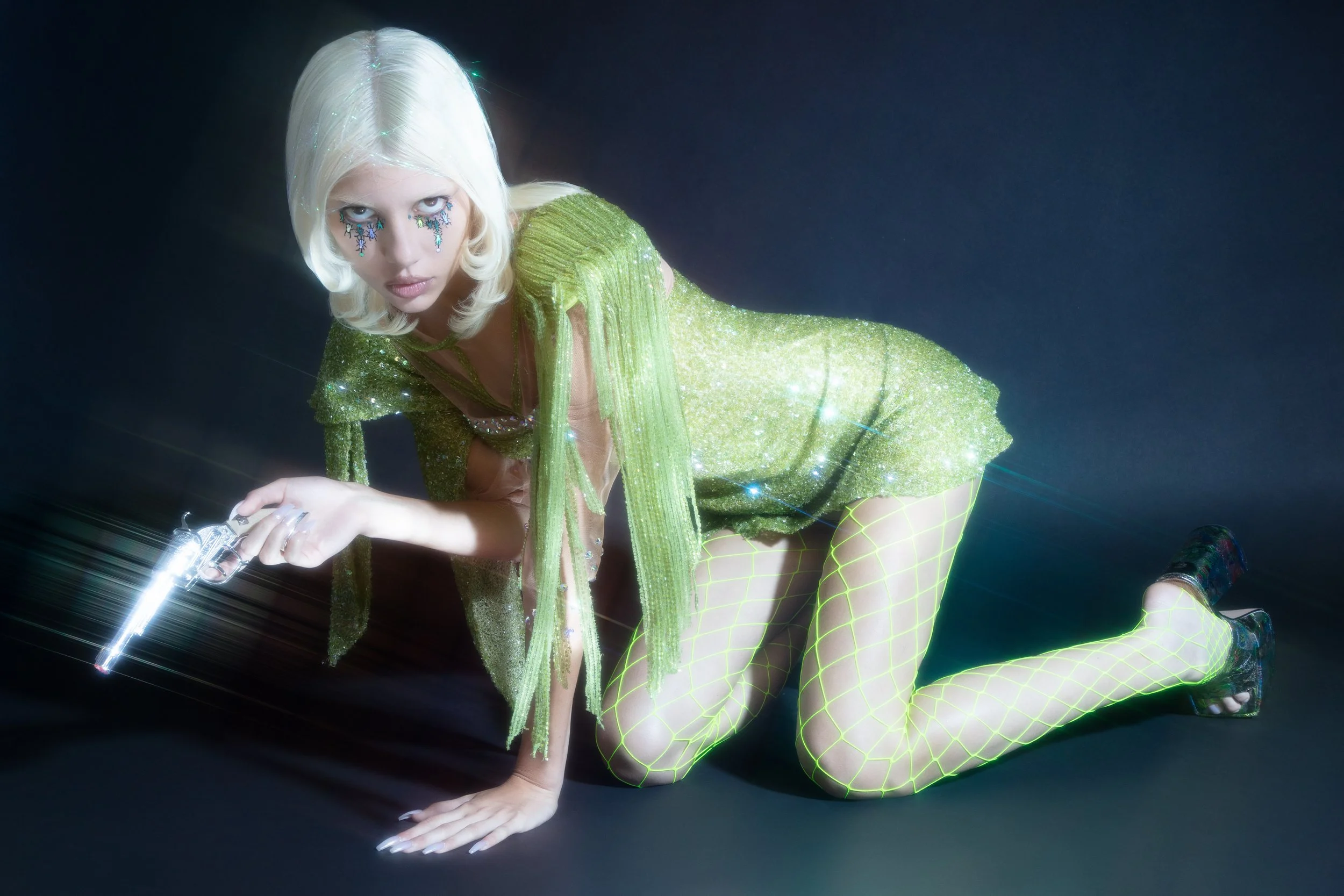 Magazine-style editorial futuristic  makeup in Miami on fashion agency model by Madeline Rouge.