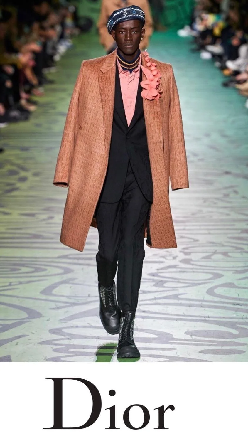 Runway makeup artist working backstage during fashion week in a high-pressure  DIOR mens show environment.