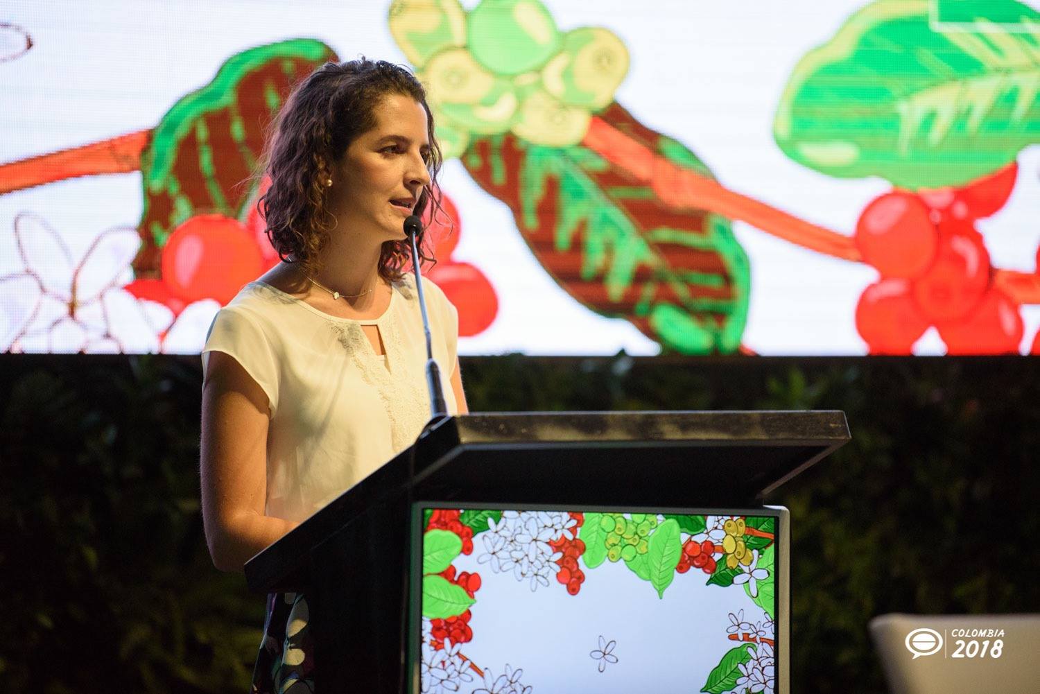 Tatiana Virviescas announcing the Transforming Mexican Coffee project during Let’s Talk Coffee. Photo: Sustainable Harvest